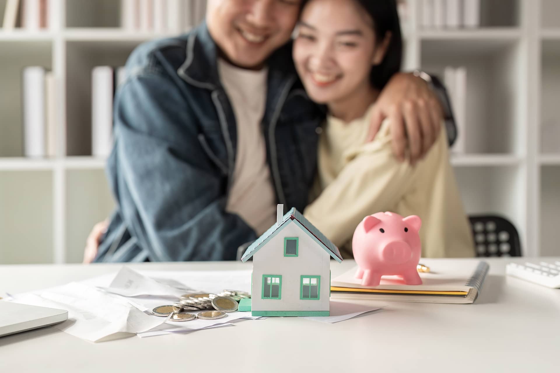 Couple planning finances with savings